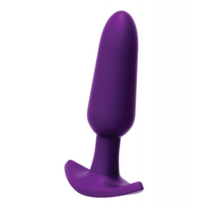 Up-right side angle view of the vibrating butt plug showing its narrow neck and tapered tip for comfort, as well as its anchor base for long wear (purple).