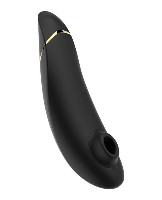 Front angle view of the Womanizer Premium Air Pulse toy, showing its clitoral hole and ergonomic design.