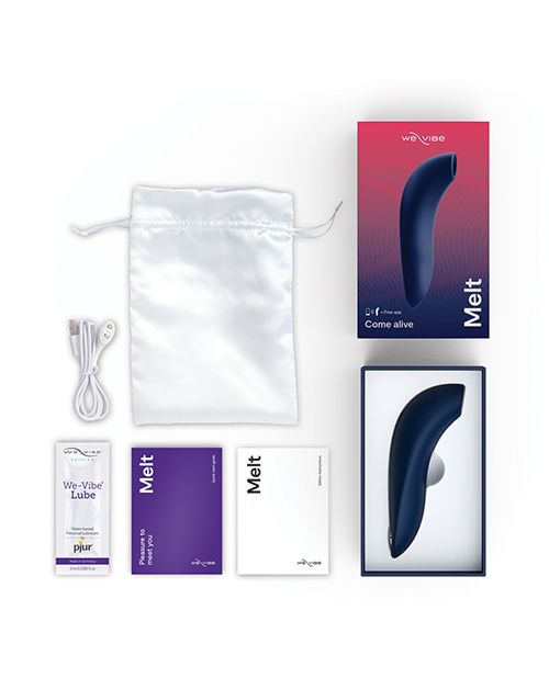 Image shows what comes with the Melt (midnight blue): toy, USB charging cord, pjur lube sample, satin storage bag and instructions.