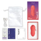 Image of what comes with the Touch X: satin storage bag, instruction manual, magnetic USB charging cord, pjur lube sample, and the toy (coral).