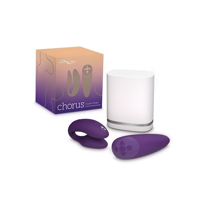 We-Vibe Chorus (purple), remote and charging dock next to its box.