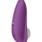 Up-right image of the toy showing its magnetic charging pins as well as the control buttons and ergonomic shape (violet).