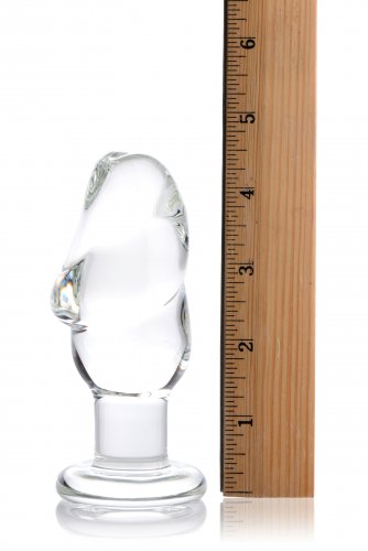 The plug next to a ruler to show its height (as noted in the description).