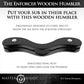Ad for the Enforcer features: Put your sub in their place with this wooden humbler. Ingeniously designed to curve and fit below the ass with the scrotum stretched, adjustable wing nuts to easily open and close the humber.