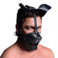 Left side angle view of a man wearing the puppy mask.