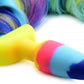 Close-up of the multicolored butt plug and portion of the unicorn tail hair.