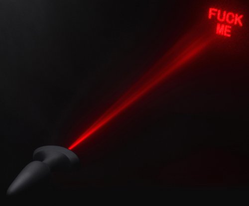 The plug is shing the red laser words onto a black background.