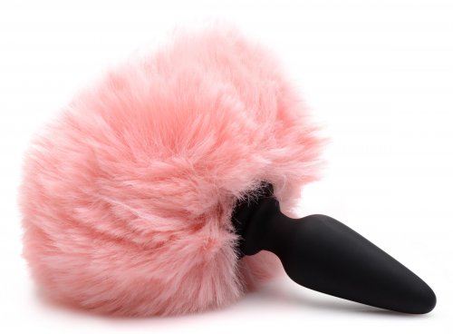 Close-up of the pink bunny tail and butt plug base.