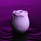 The Wild Rose sitting in purple tinted water surrounded by ripples.