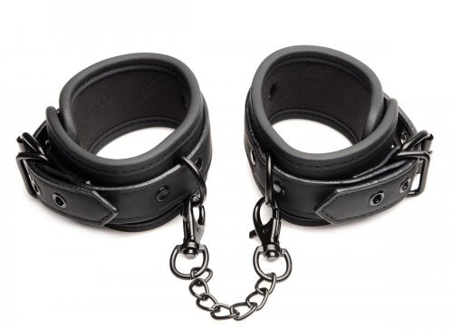 Image of the ankle cuffs buckled and connected to one another by the short chain.