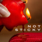 Fox candle ad shows image of lit candle dripping hot wax onto red rope (look for Temptasia Bondage Rope to pair) and states: Not Sticky